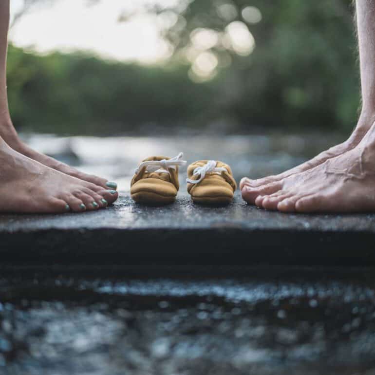 Foto Babyschuhe im Wasser